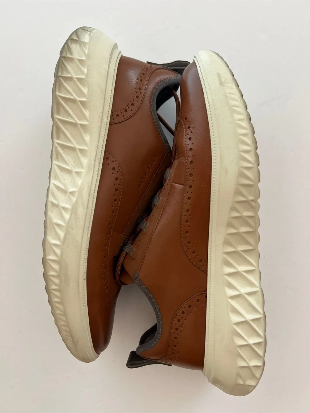 Cole Haan ZERØGRAND British Tan Leather Wingtip Sneaker with Cream Sole